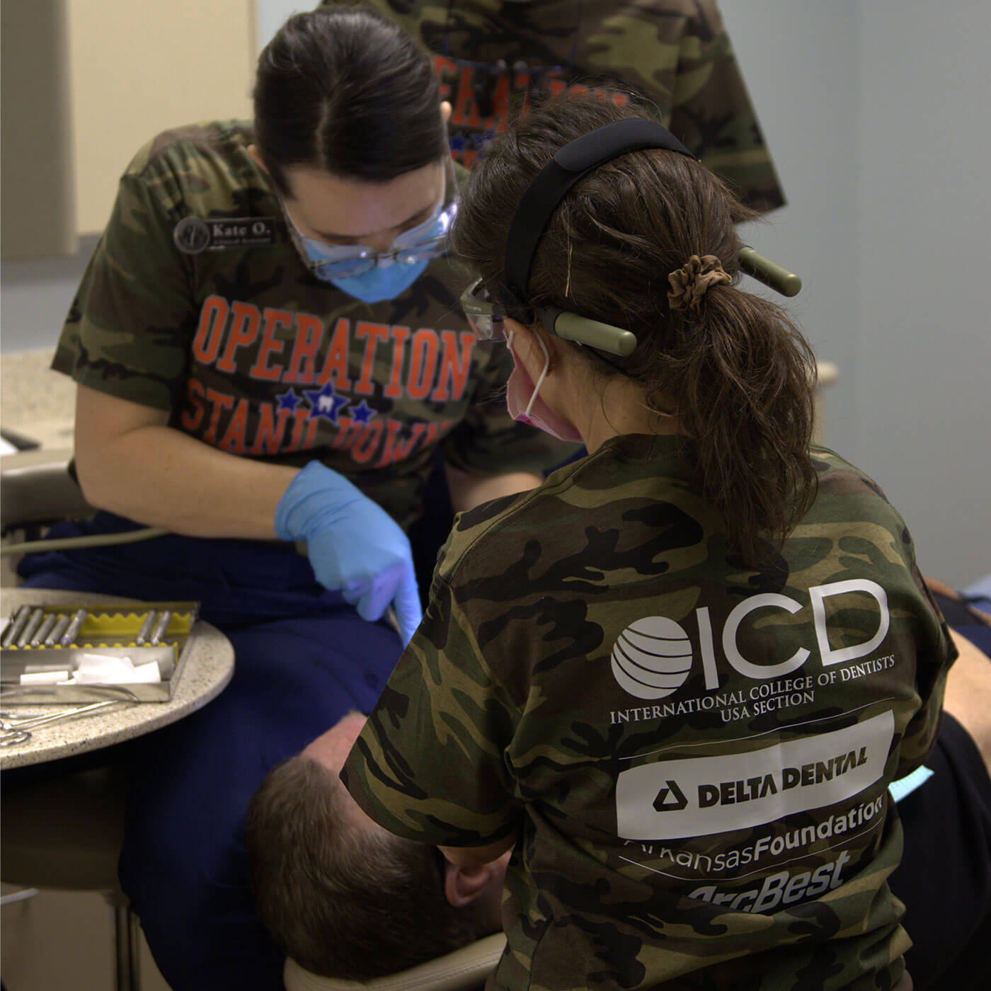 A woman in a camo shirt, representing Delta Dental's commitment to improving veterans' health care access.